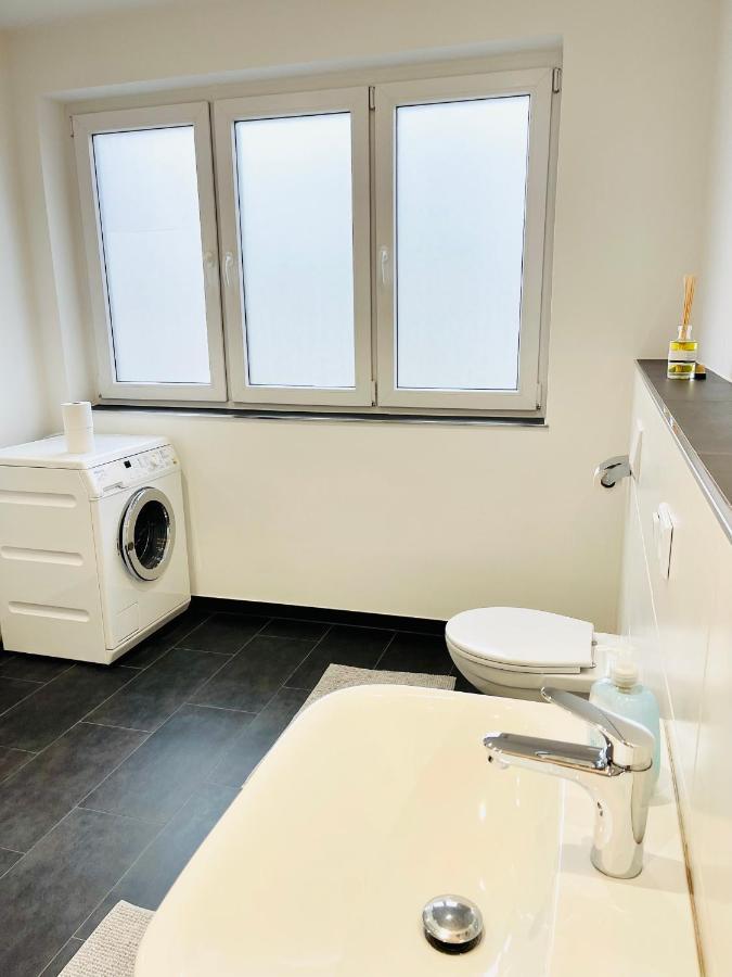 Charmante Ferienwohnung Mit Terrasse Im Herzen Von Norden Esterno foto